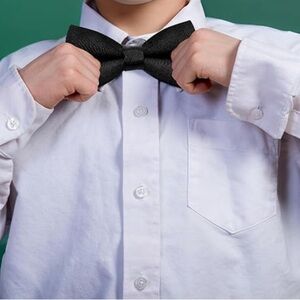 6 Kid’s bow ties black adjustable,  5 new in boxes, 1 bow tie new, unboxed.